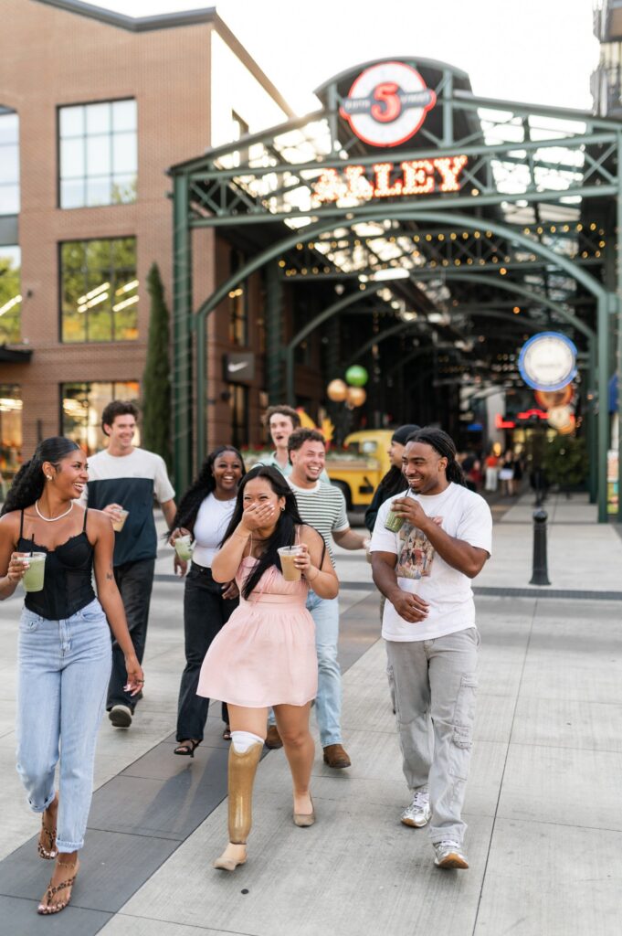 Group of friends hanging out at the 5th Street Public Market in Eugene