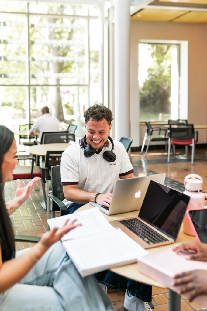 Group of friends studying in the library at the University of Oregon