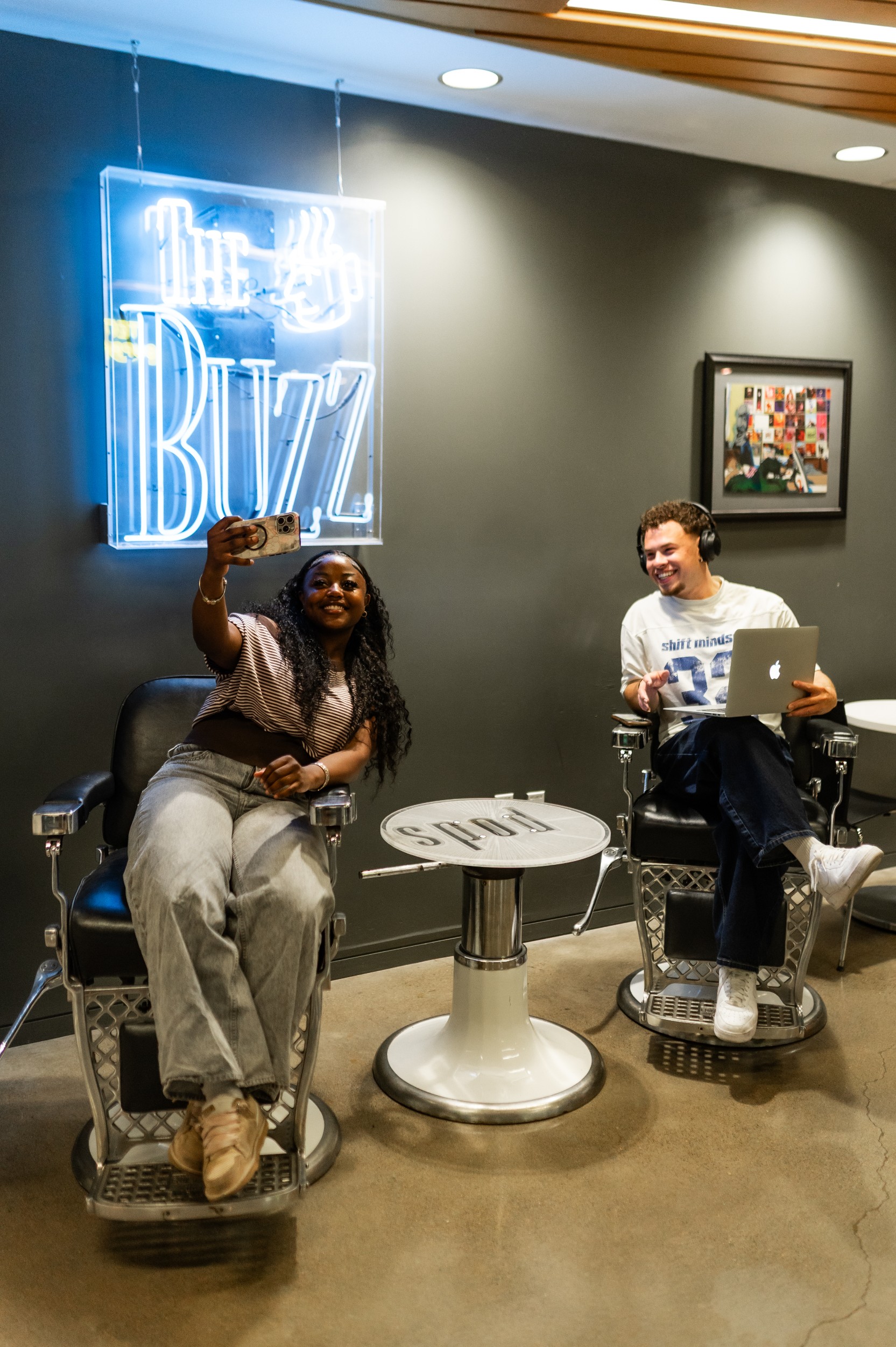 Two friends hanging out at The Buzz in the EMU
