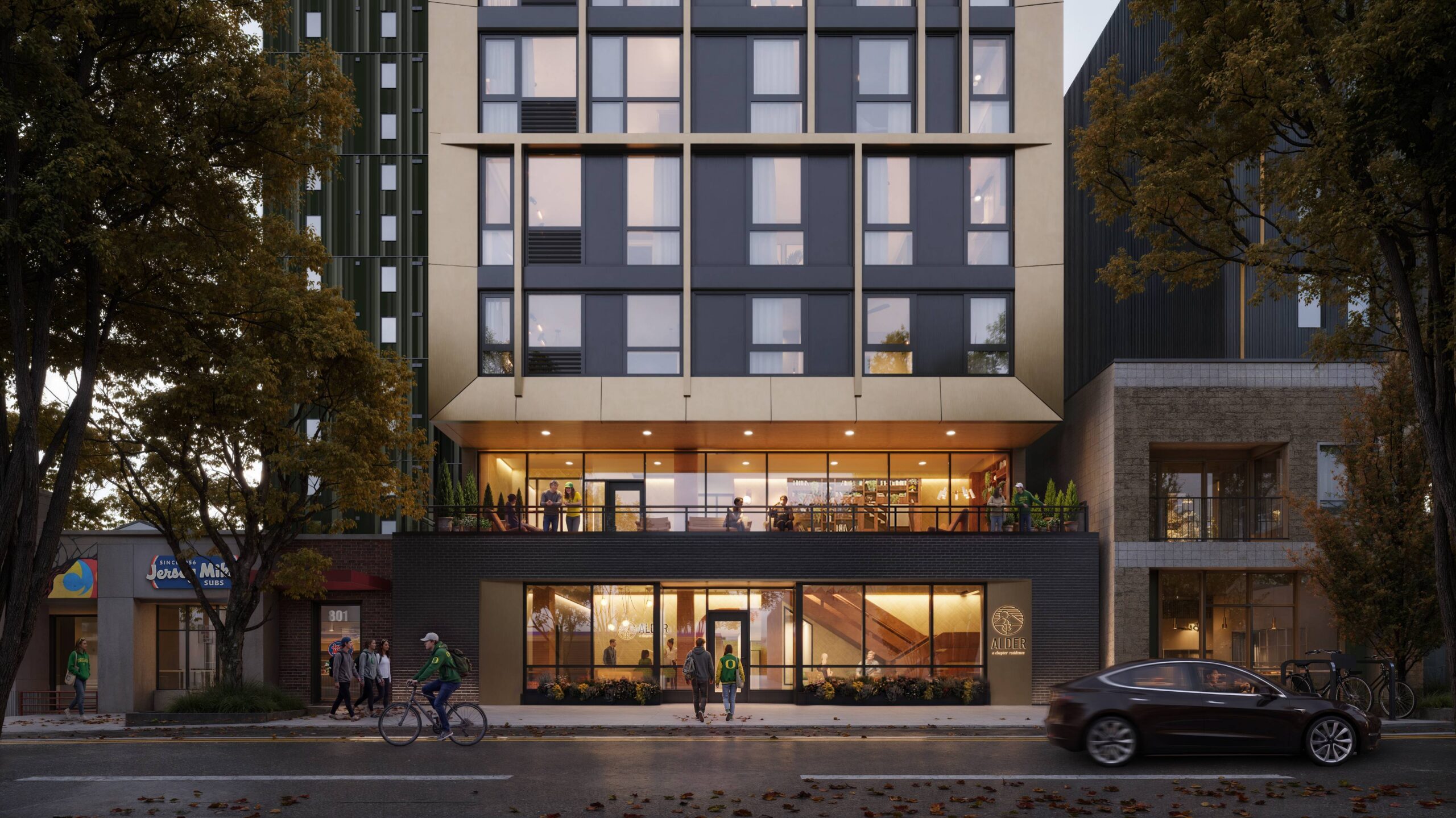 Street view of Alder apartments at sunset